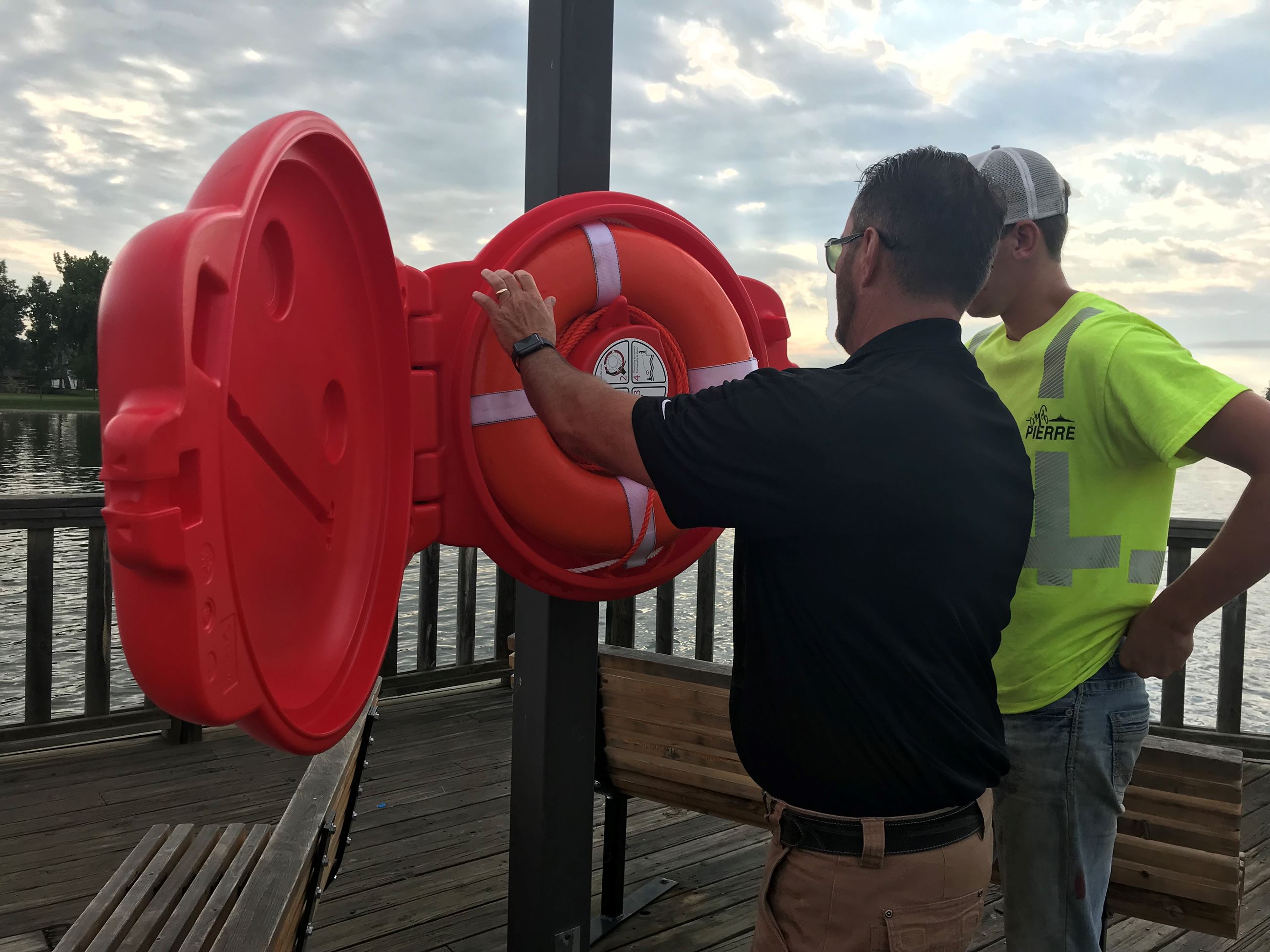 Fire Chief Ian Paul inspects new buoy